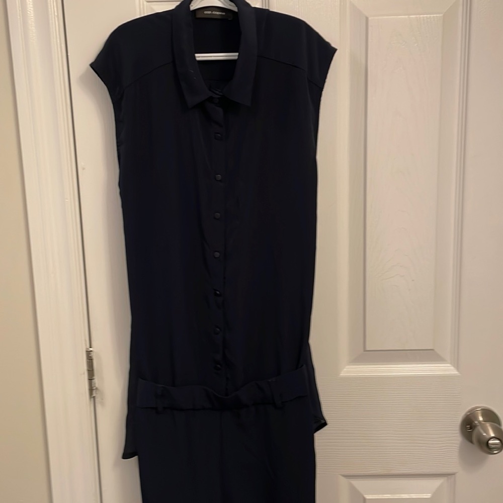 Coo copine jumper.  Navy. Size small.  Back is sheer.  Belt loops. Beautiful